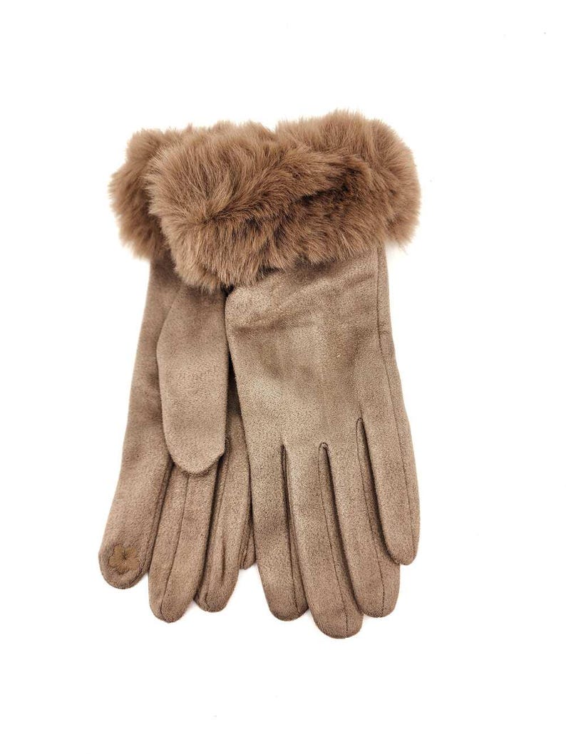 May include: A pair of brown suede gloves with a faux fur cuff. The gloves are folded together and the fur cuff is visible.