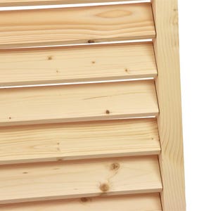 May include: Close-up of a wooden shutter with horizontal slats. The slats are made of light-colored wood and are arranged in a staggered pattern.