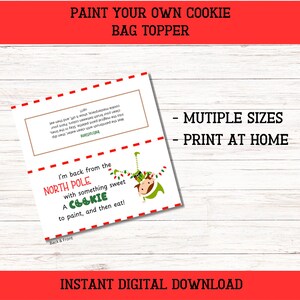 May include: Printable cookie bag topper featuring an elf hanging from Christmas lights with the text "I'm back from the North Pole with something sweet A COOKIE to paint, and then eat!"  The text "PAINT YOUR OWN COOKIE BAG TOPPER" is at the top of the image. The text "MULTIPLE SIZES - PRINT AT HOME" is on the right side of the image. The text "INSTANT DIGITAL DOWNLOAD" is at the bottom of the image.