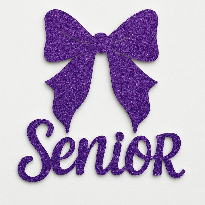 May include: A purple glitter bow with the word "Senior" in a cursive font. The bow is at the top of the image, and the word "Senior" is below it. The background is white.
