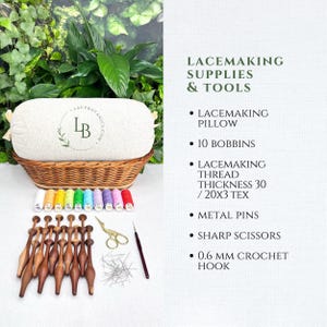May include: A lacemaking kit featuring a cylindrical beige pillow in a wicker basket, ten wooden bobbins, assorted colorful thread spools, metal pins, gold-toned scissors, and a 0.6 mm crochet hook. Text reads: LACEMAKING SUPPLIES & TOOLS.