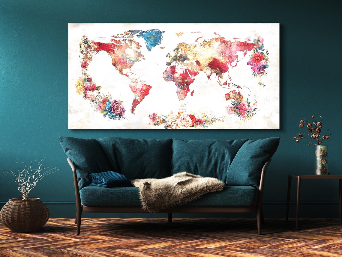 Dining room mockup showing a large floral world map artwork above a table with candles