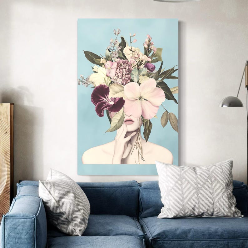 Pastel floral woman portrait with blush and cream blossoms on a sky-blue background