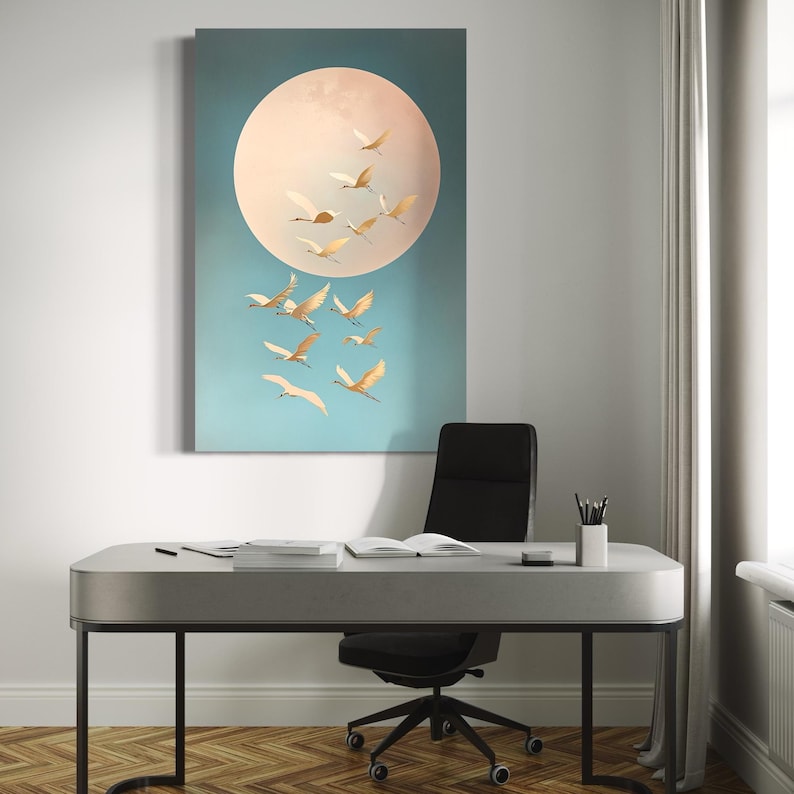 Birds in flight around a pale moon on a muted teal background