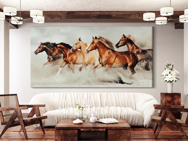 Realistic image of four galloping horses with flowing manes across sandy ground and a hazy pale background