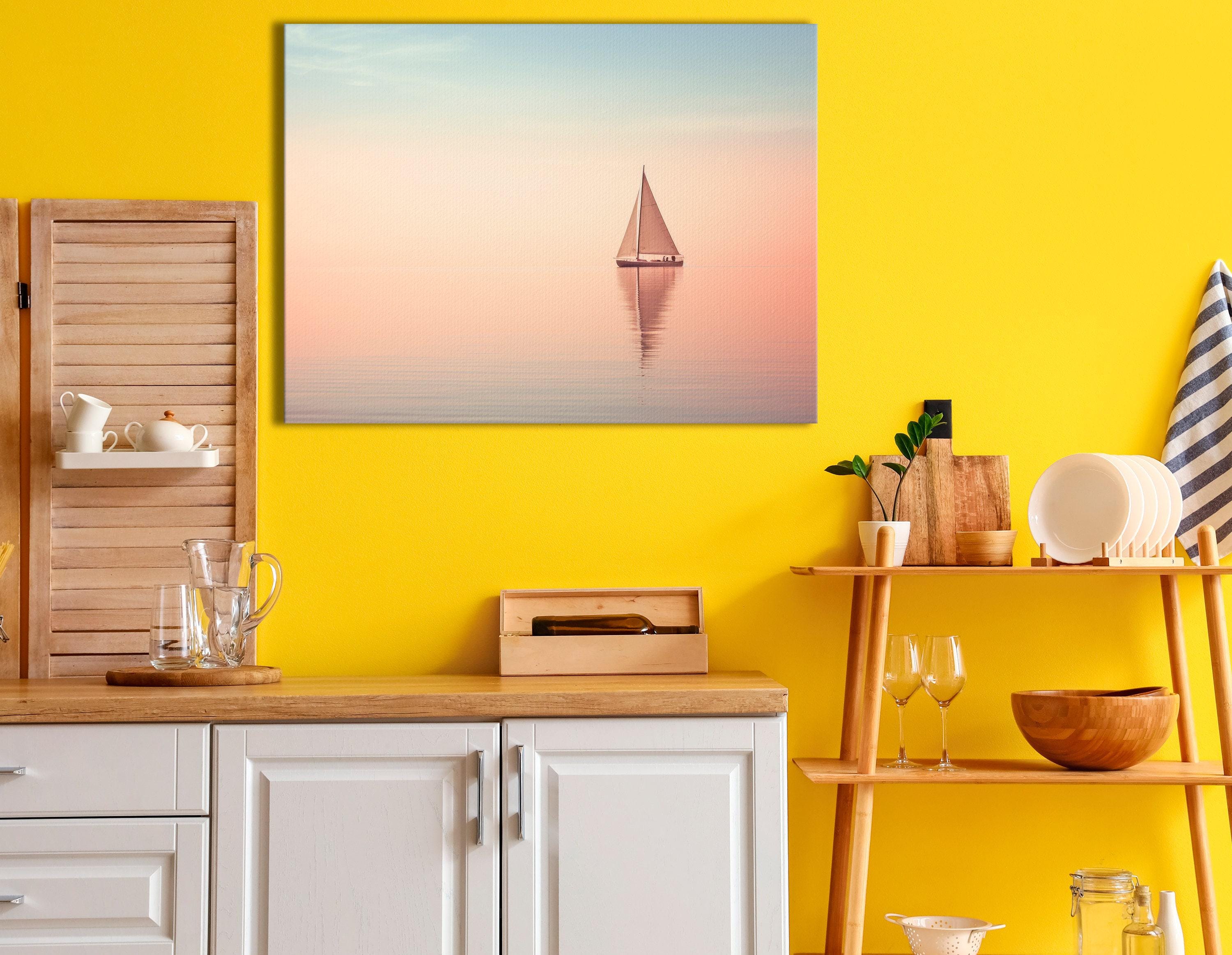 Bedroom scene with a framed pastel sailboat seascape above a bed