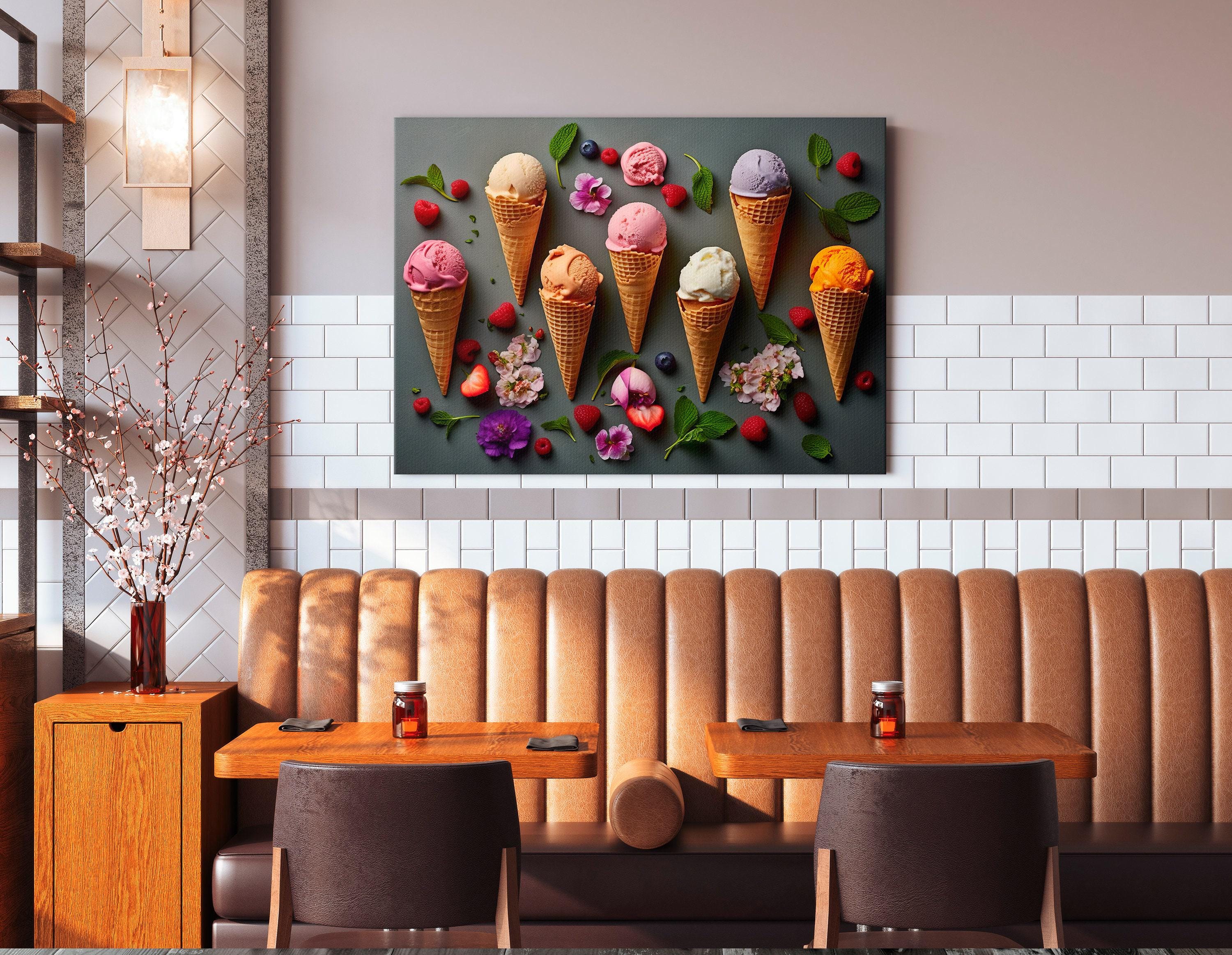 A colourful arrangement of ice-cream cones, scoops and berries sits on a dark grey background, surrounded by scattered flowers and mint leaves detail