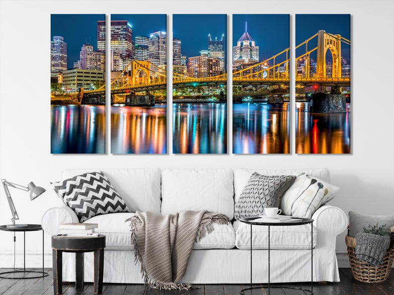 Five-panel night cityscape with a glowing gold bridge, skyscrapers and reflections in dark water