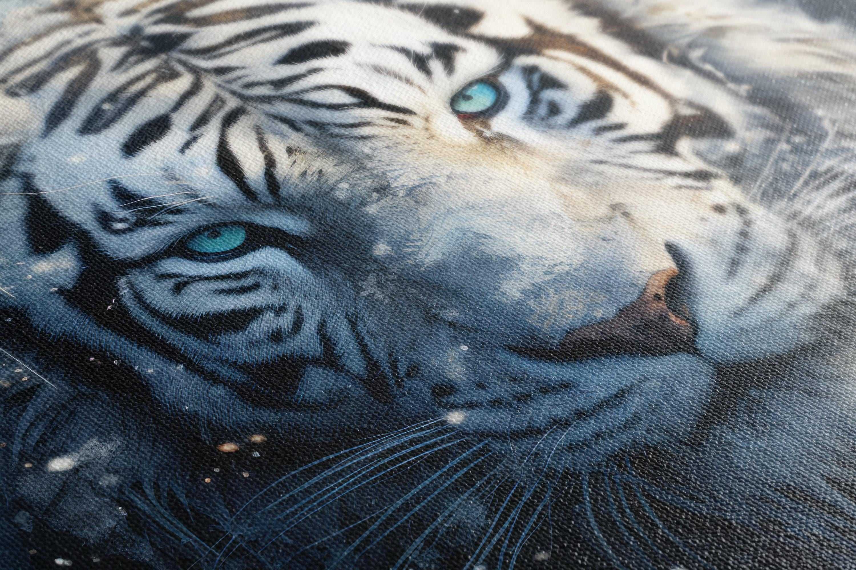 White tiger portrait with blue eyes and falling snow flecks on a dark icy blue background detail view