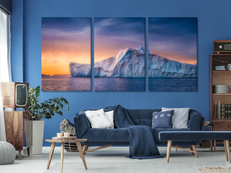 Polar seascape artwork with a glacier face, dark ocean water and a pink-blue dusk sky