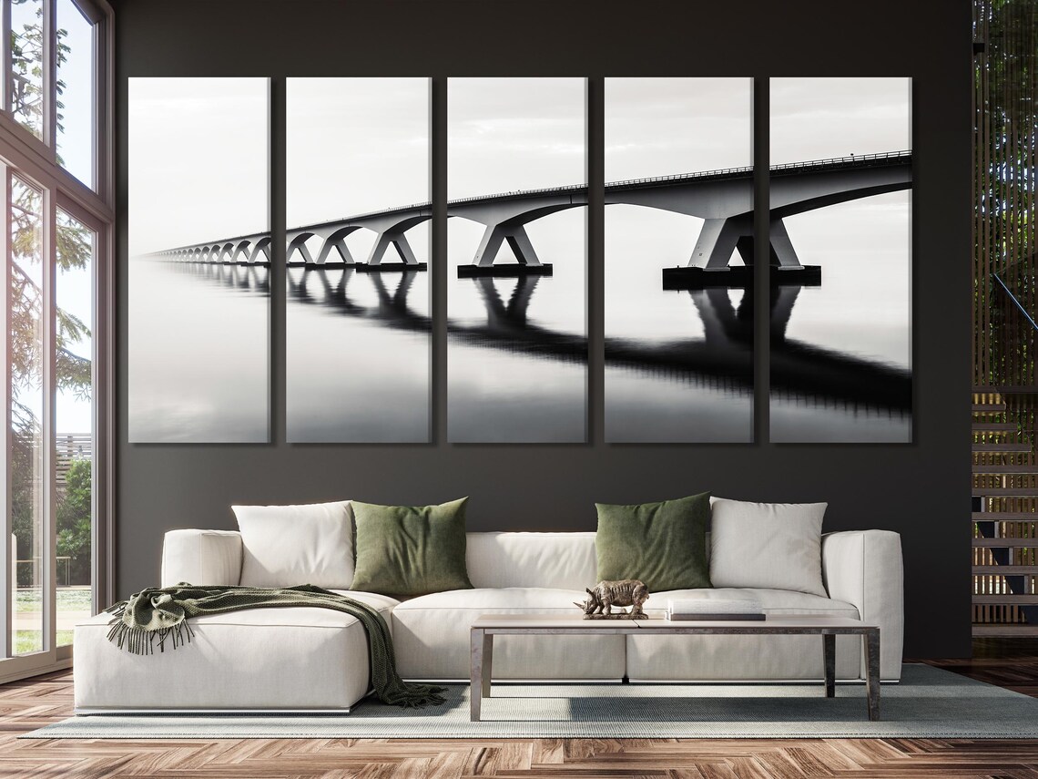 Room mockup showing a black and white arched bridge artwork above a wooden sideboard