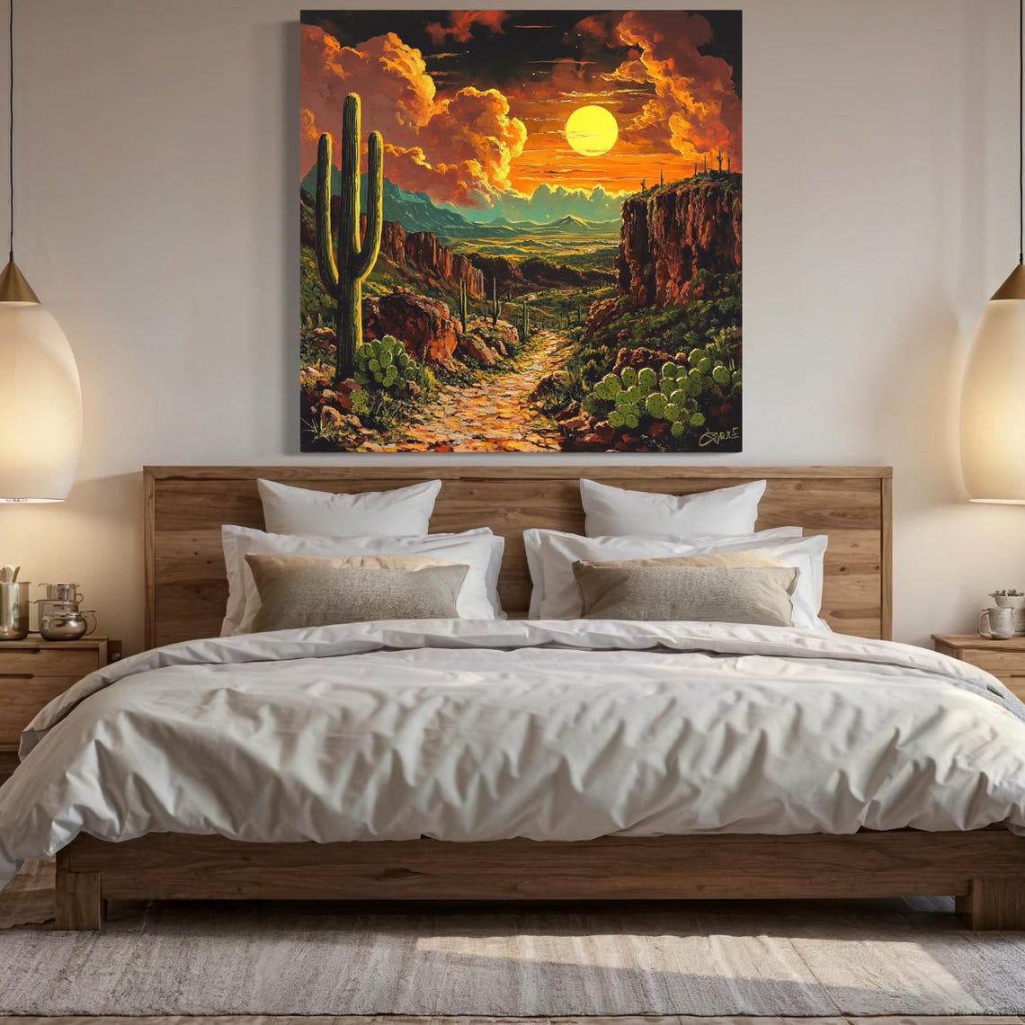 Desert sunset landscape wall art above a bed in a bright room