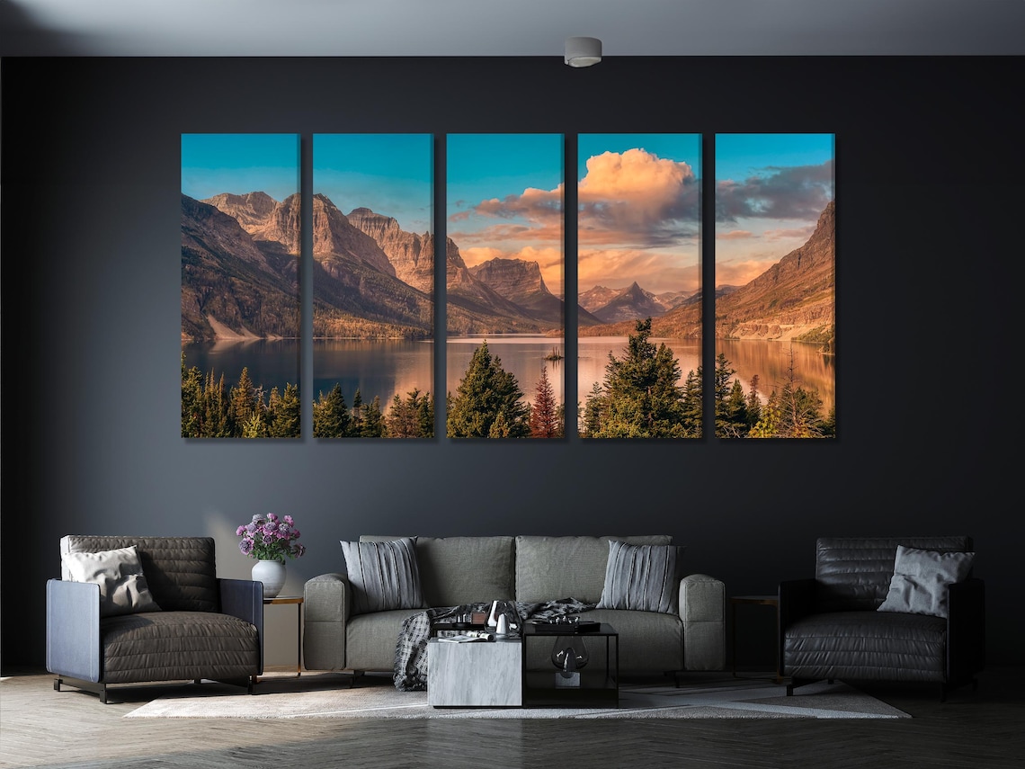 Three-panel landscape artwork with mountains, evergreen trees, calm lake reflections and a sunset sky detail view