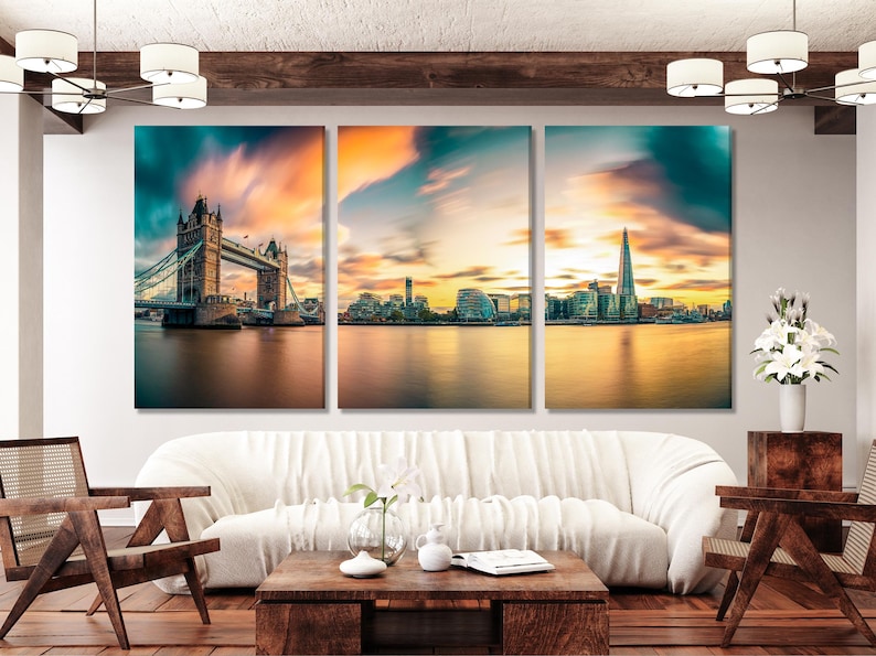Three-panel city skyline at sunset with teal clouds and golden river reflections