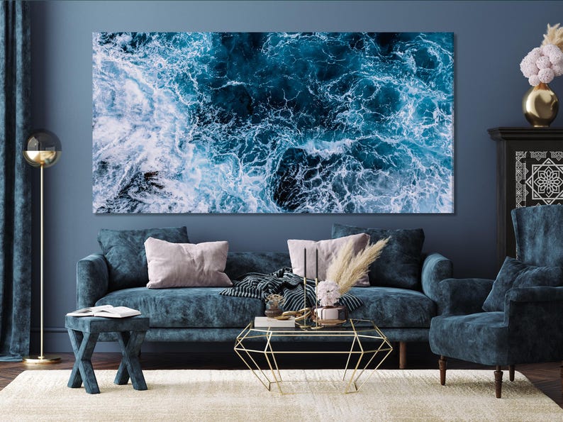 Modern ocean-themed artwork highlighting striking white foam and deep blue water currents, bringing a fresh nautical vibe to your home décor.