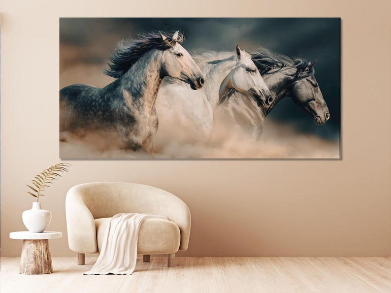 Running horses artwork in neutral tones with layered equine figures and dust-like haze