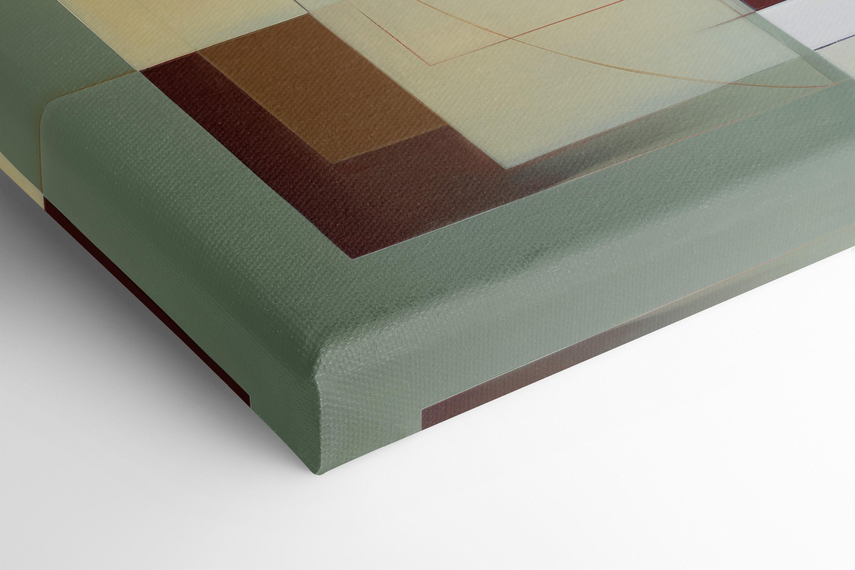 A framed abstract geometric composition combines muted sage and terracotta blocks with cream and burgundy lines in a balanced, mid-century style