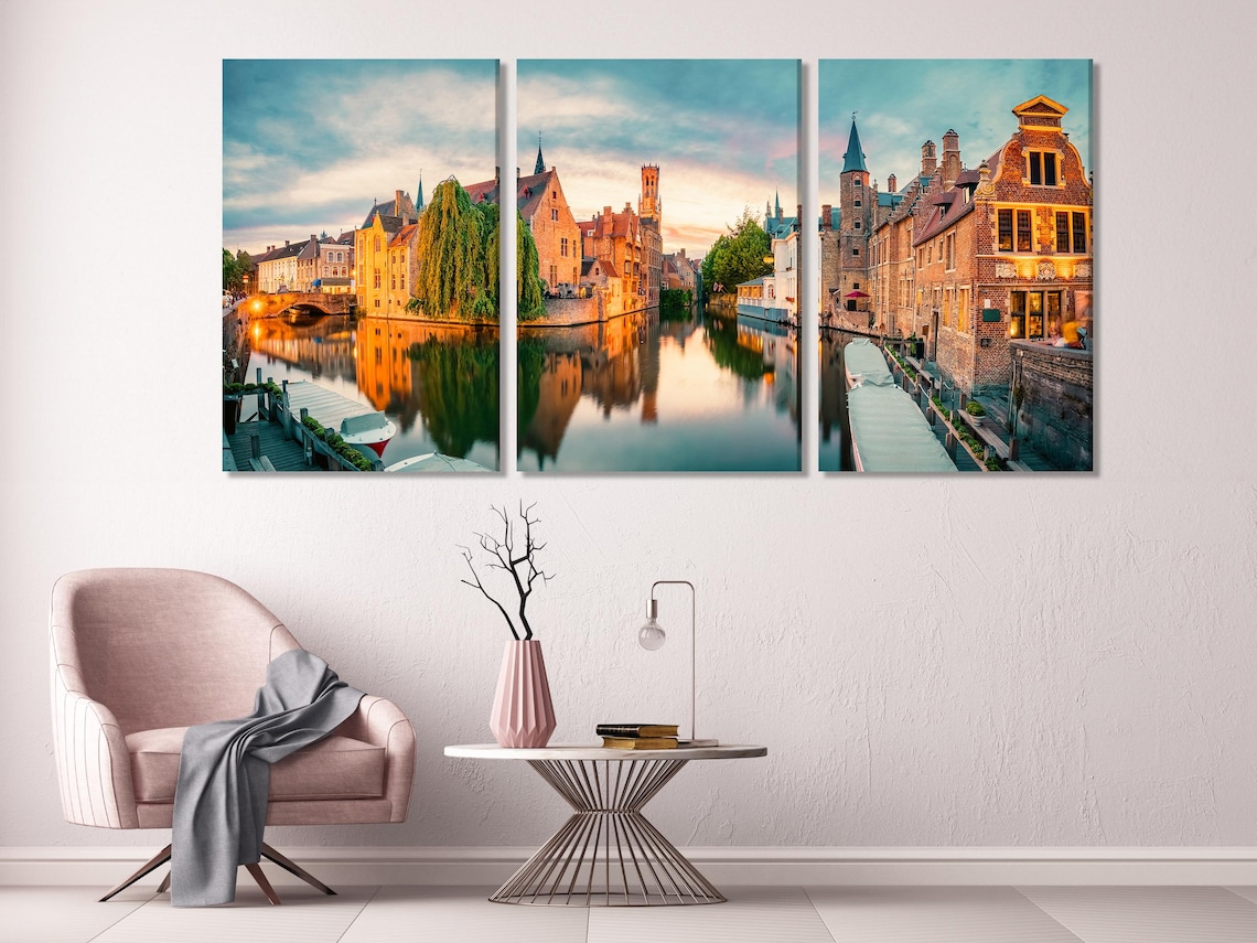 Living room mockup wall with split vertical canal cityscape artwork above a sofa