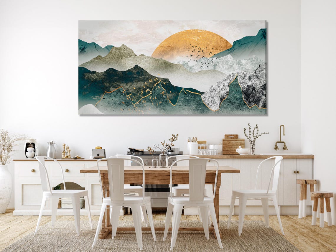 Abstract three-panel mountain landscape with teal slopes, warm gold sky and misty clouds detail view