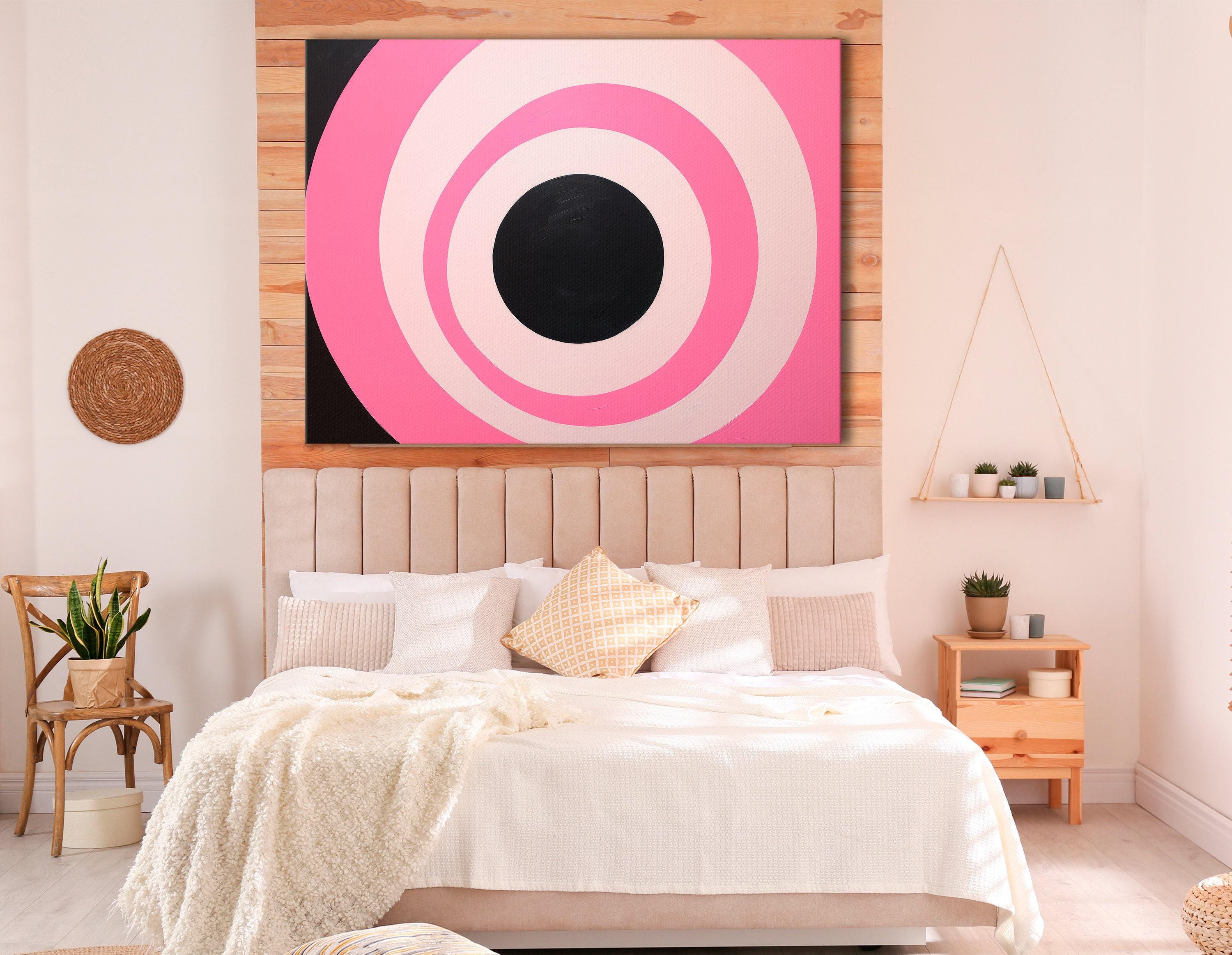 Hot pink and black concentric circles geometric artwork with pale ivory rings detail view