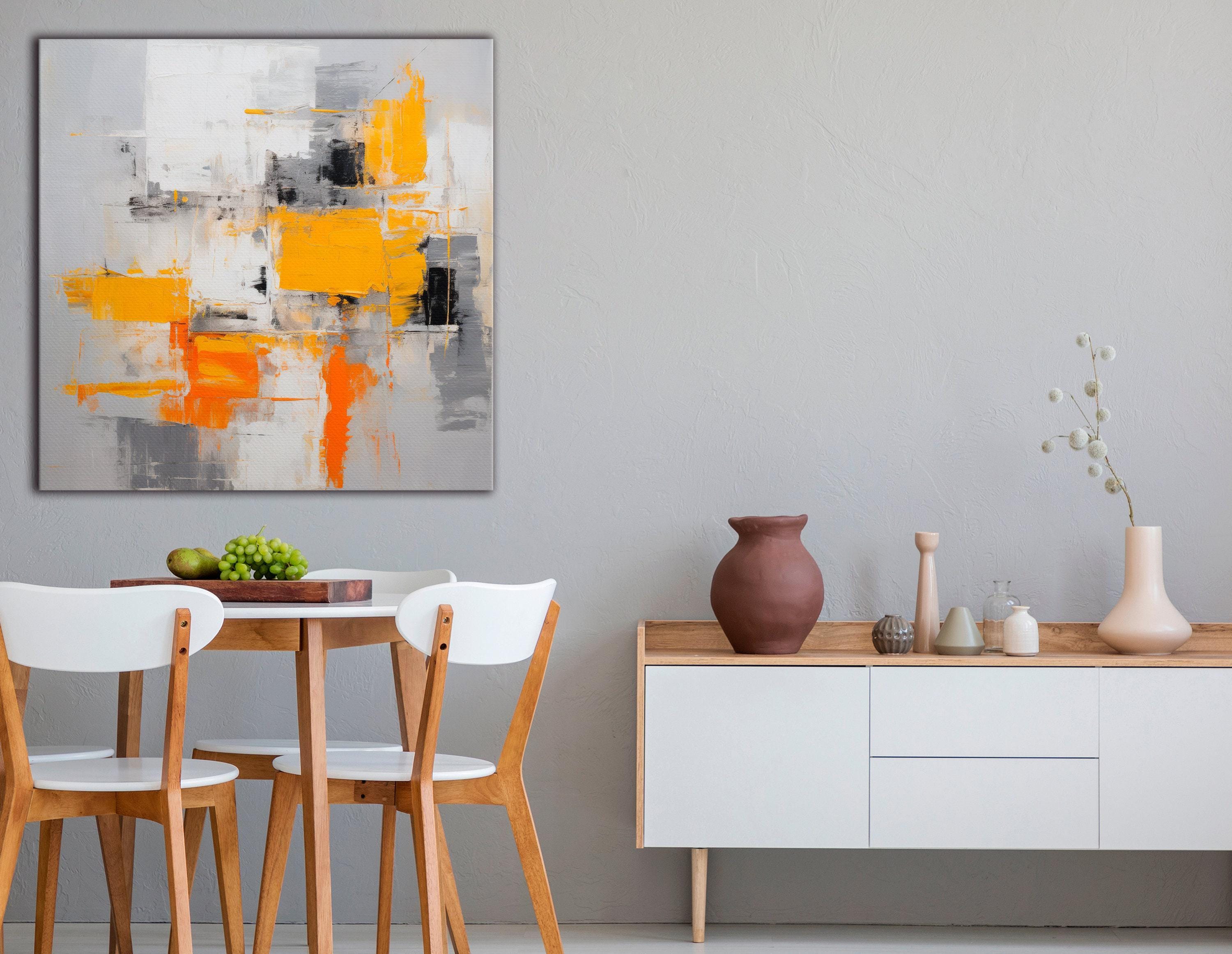 An abstract city-block style collage of white, grey and black shapes is overlaid with bright yellow and orange blocks, accented by scumbled
