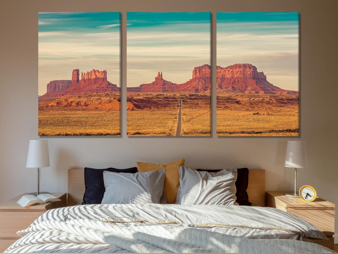 Bedroom mockup with a panoramic desert landscape wall artwork above a bed