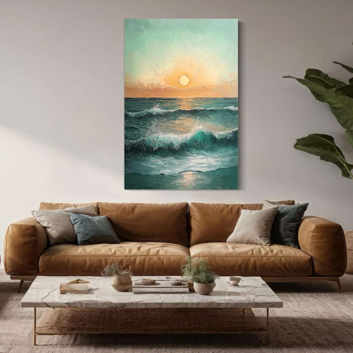 Ocean sunset seascape artwork displayed in an outdoor patio setting with seating