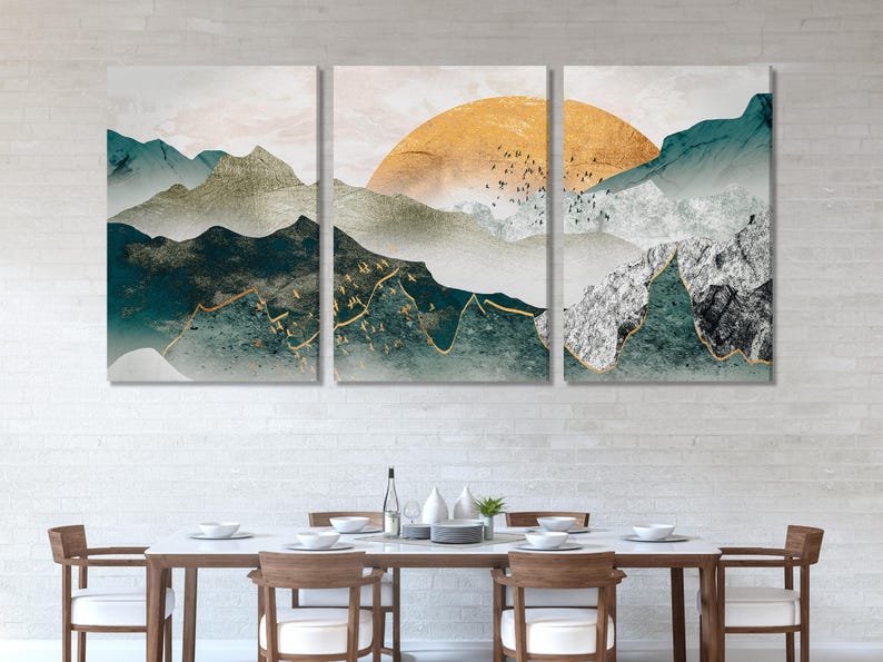 Abstract three-panel mountain landscape with teal slopes, warm gold sky and misty clouds