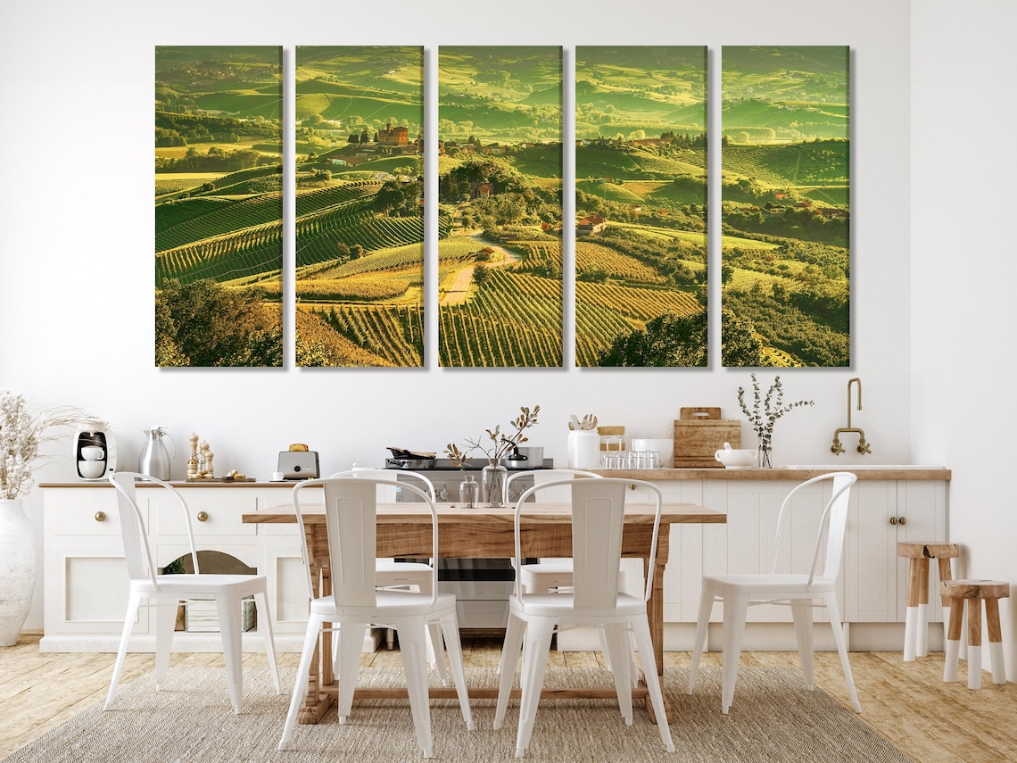 Sunlit countryside vineyard landscape with patterned rows of green hills and warm golden highlights detail view