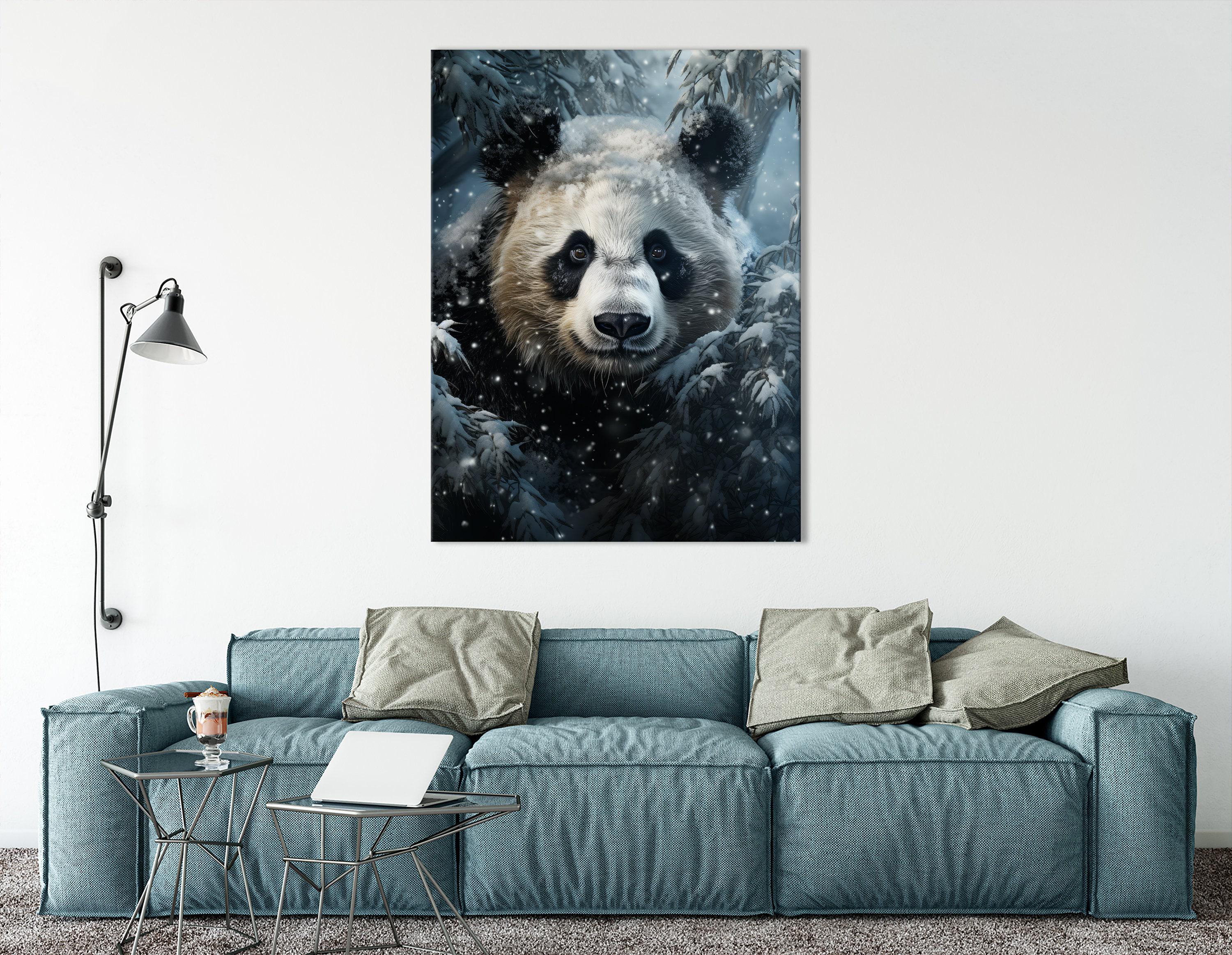 Snowy panda face artwork with falling snow and dark evergreen trees detail view