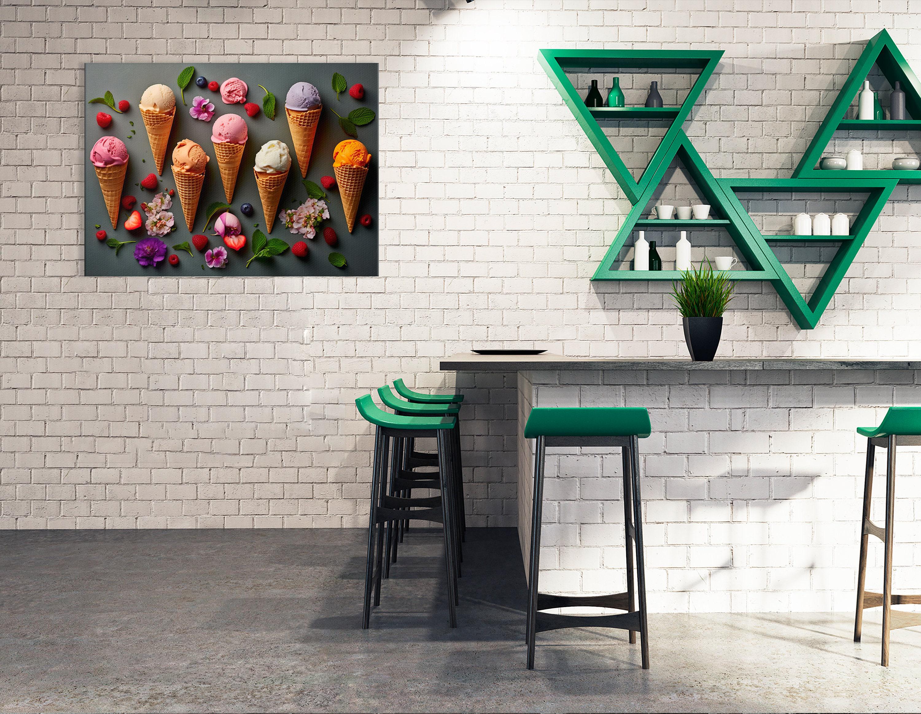 A colourful arrangement of ice-cream cones, scoops and berries sits on a dark grey background, surrounded by scattered flowers and mint leaves detail
