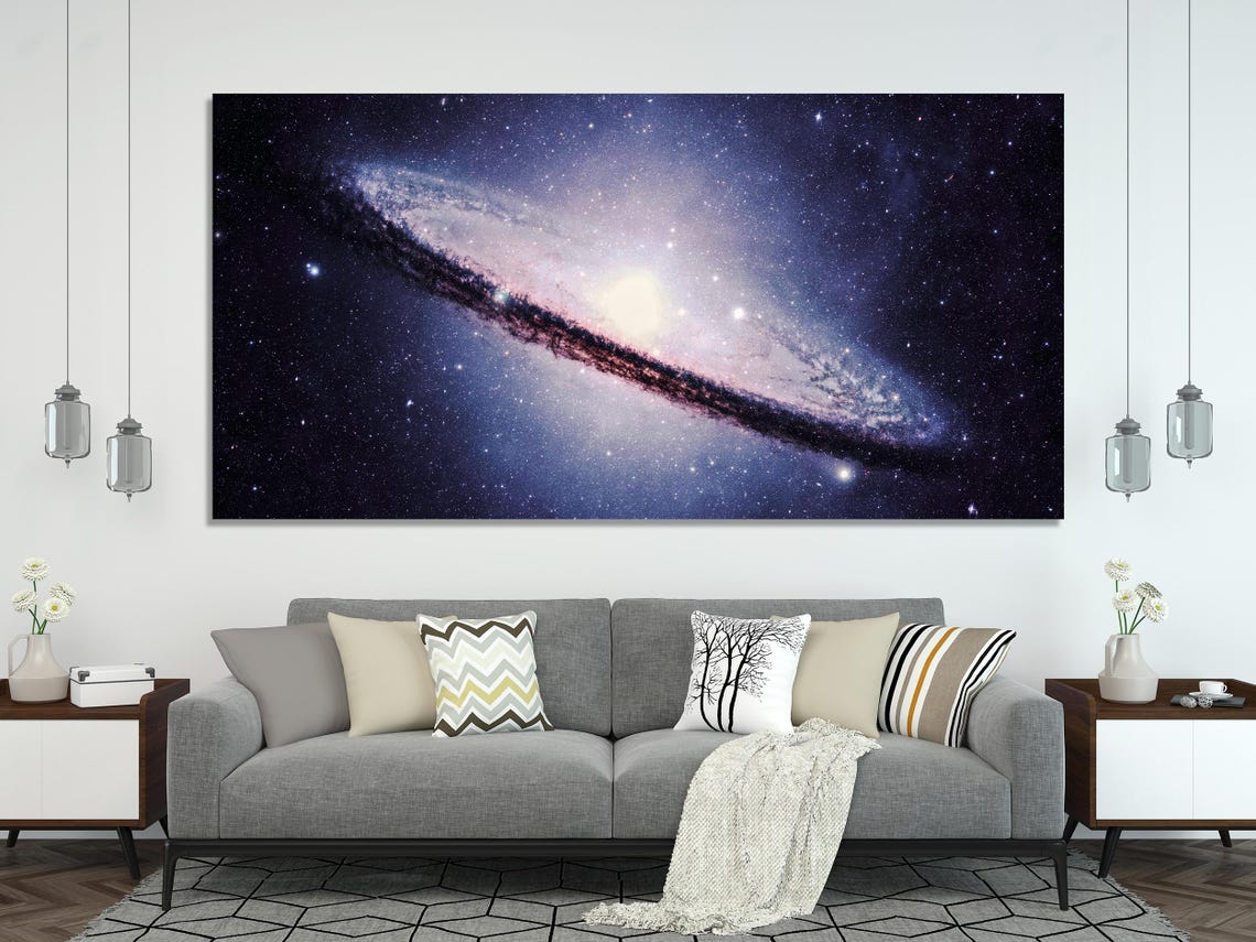 Room mockup showing three-panel starry galaxy artwork above a sofa