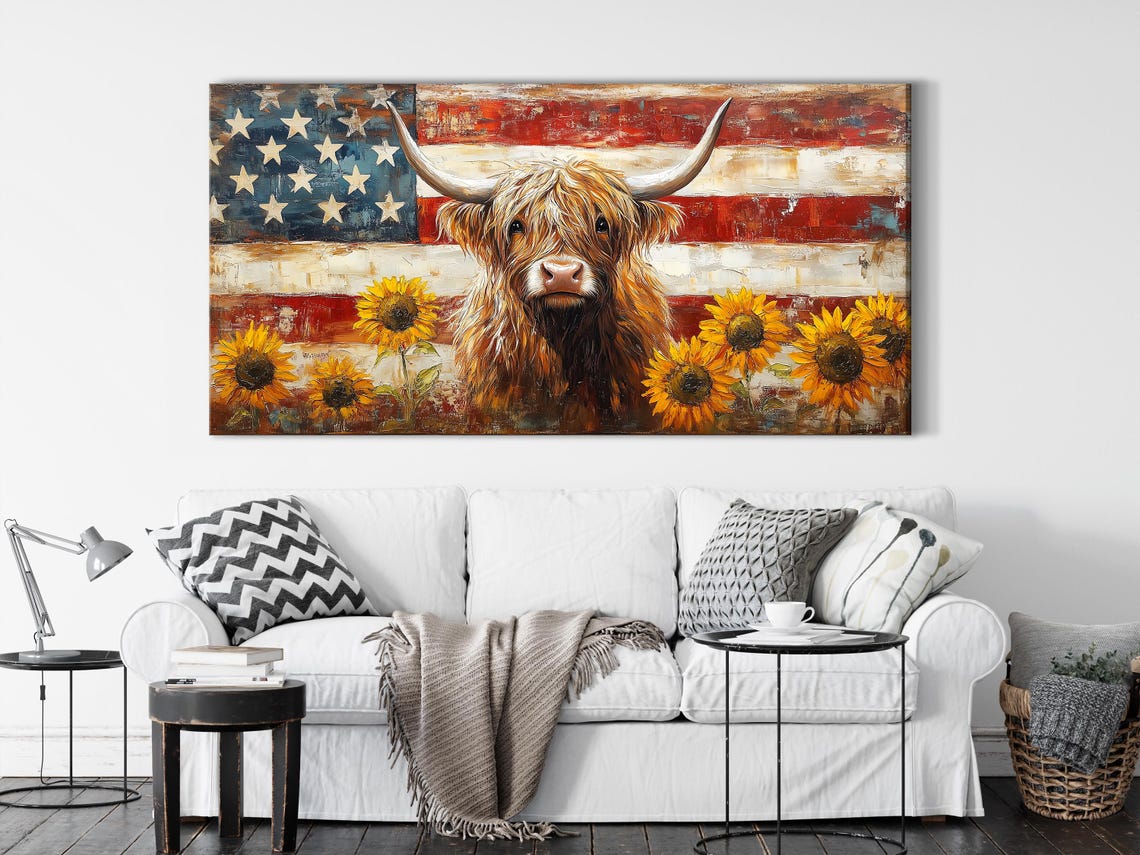 Living room mockup with a sofa and framed cow-and-sunflower artwork on the wall