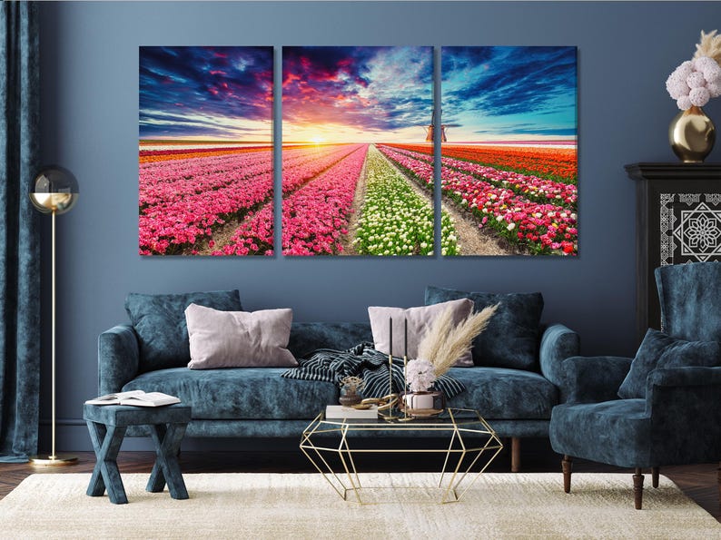 Three panel landscape showing a tulip field with a central pathway and windmill against a sunset sky