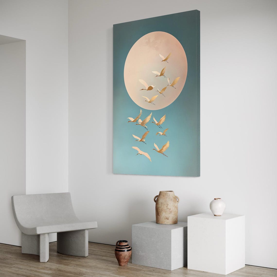 Room mockup showing a wall hanging with birds in flight around a pale moon