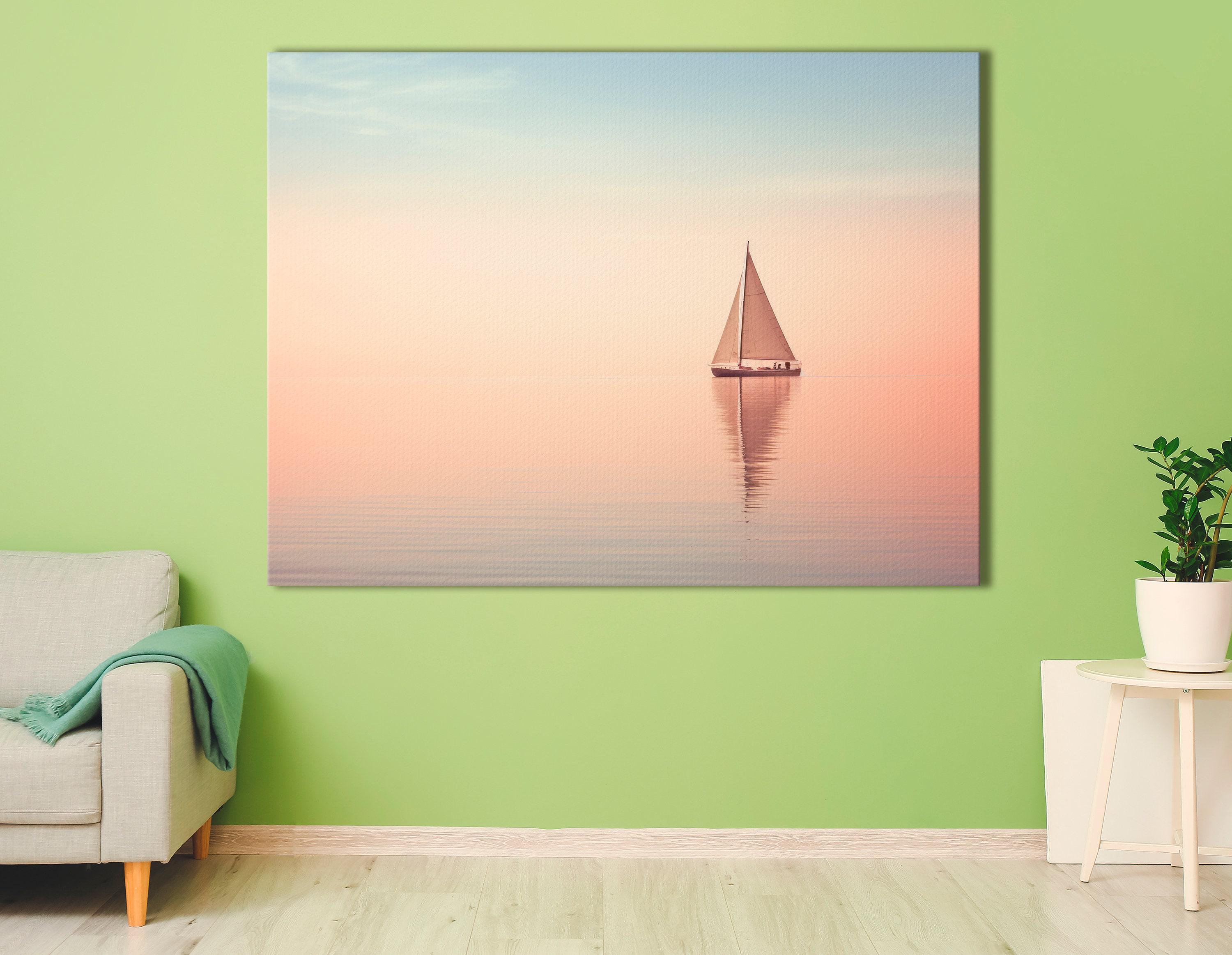 Bedroom scene with a framed pastel sailboat seascape above a bed
