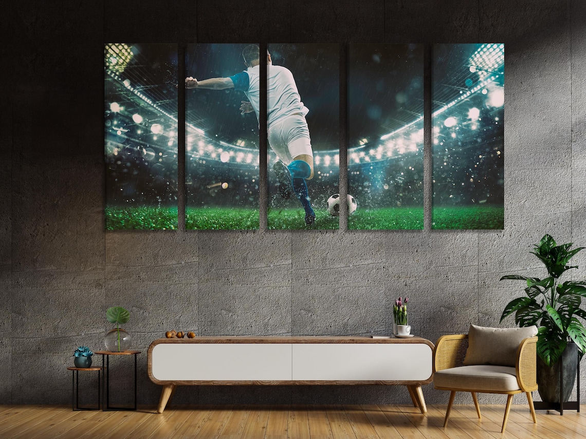 Room mockup showing three football action wall artworks above a sofa