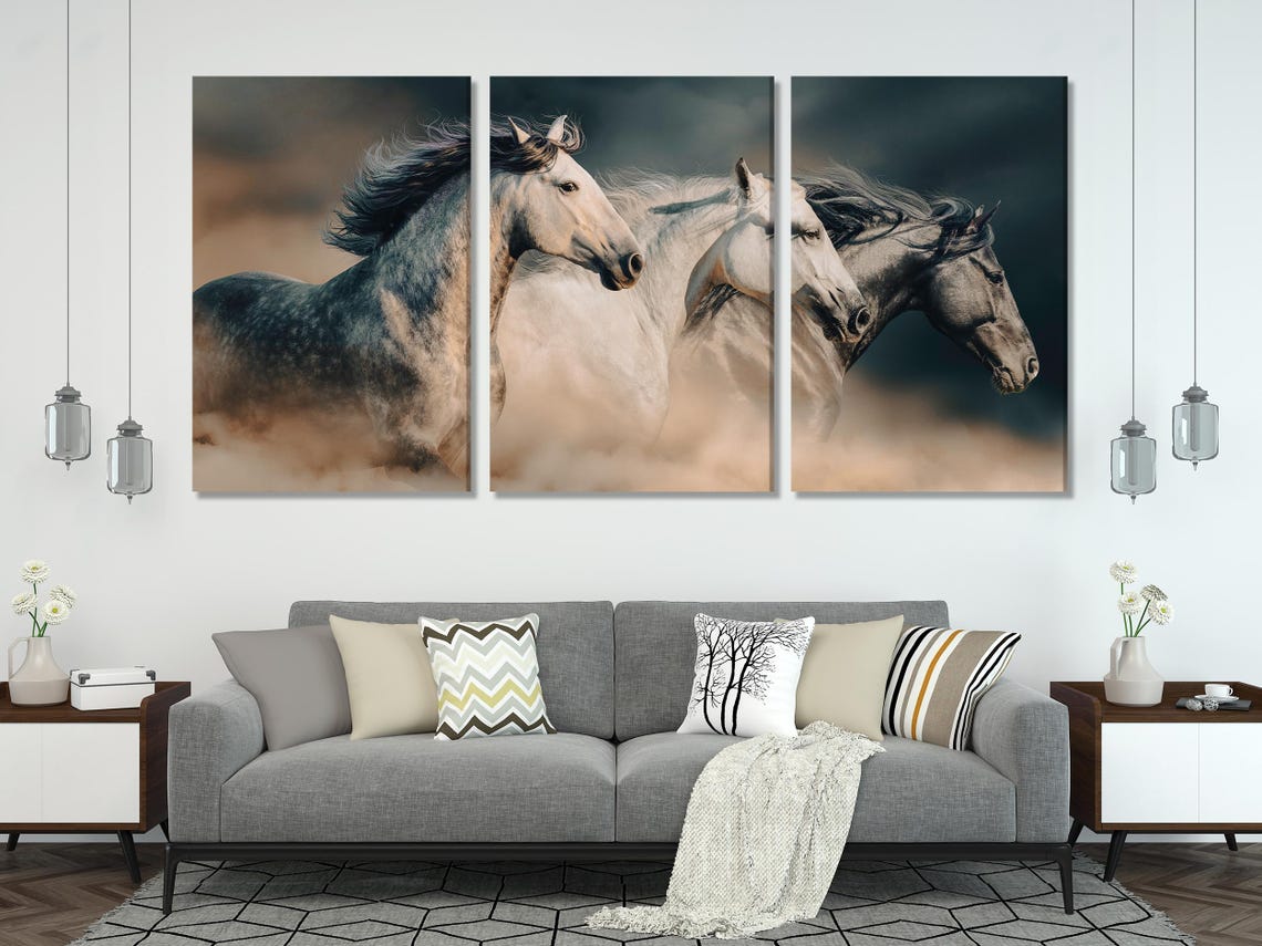 Room mockup showing a running horses artwork above a sofa