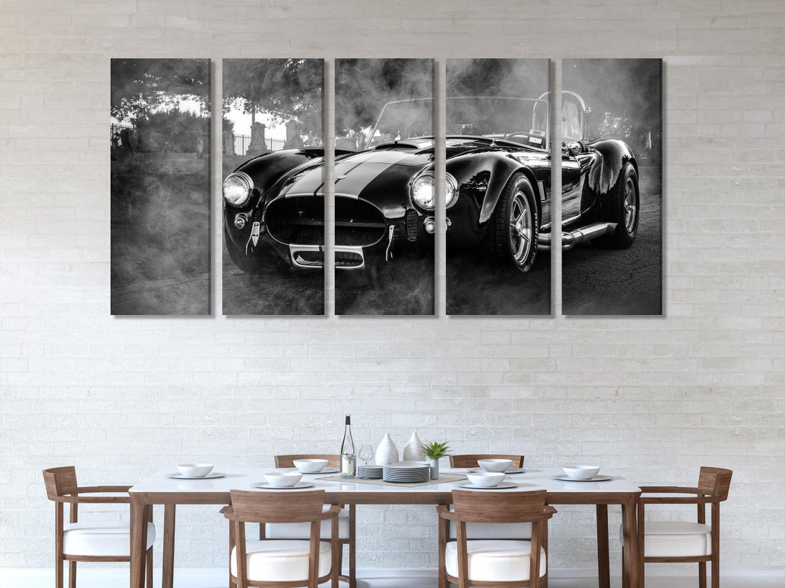Black-and-white classic sports car across three vertical panels with misty outdoor background and bright headlights detail view