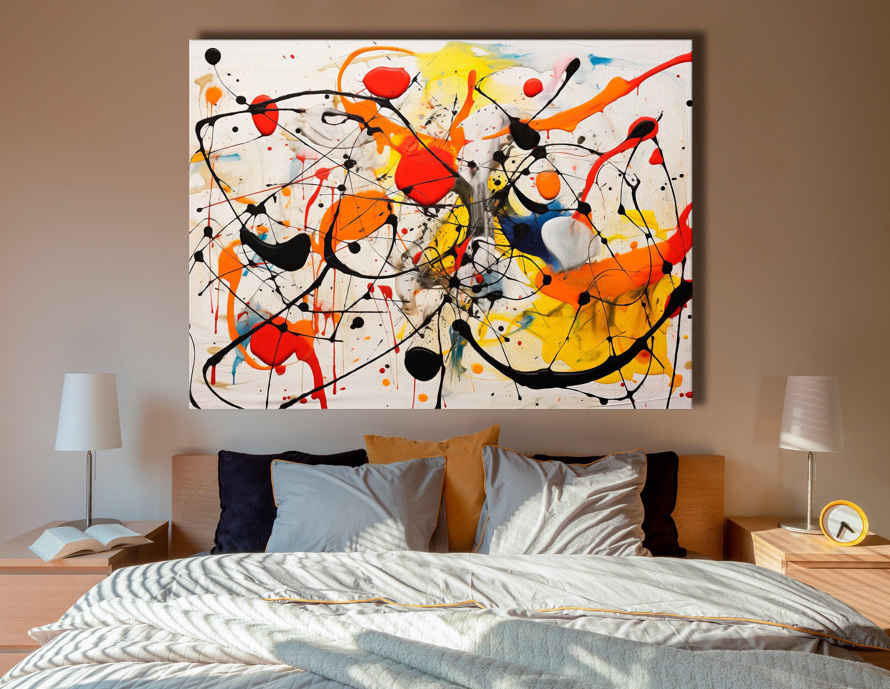 Abstract splatter artwork with black looping lines and red, orange, yellow and blue paint bursts on a white background detail view