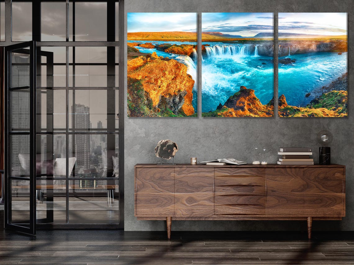 Room mockup showing five vertical waterfall artworks above a dining table and chairs in a bright kitchen