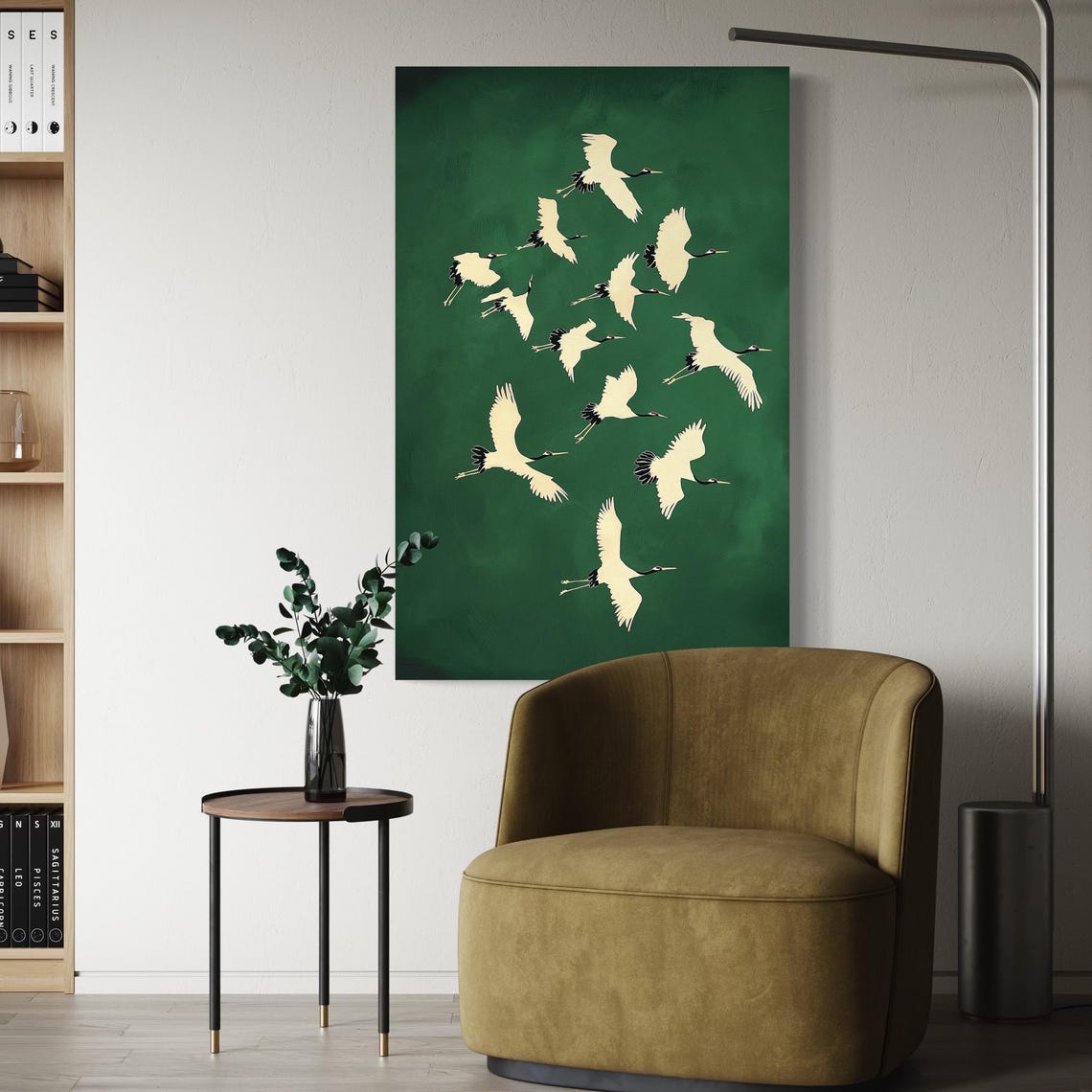 Room mockup with an emerald green wall art featuring cranes in flight