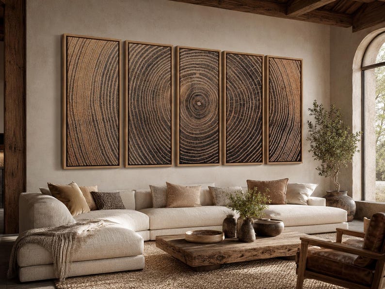 A set of five rectangular wall art panels featuring a continuous wood grain cross-section pattern in shades of dark brown and tan. Each panel is encased in a thin, light-colored wooden frame, displaying concentric tree rings.