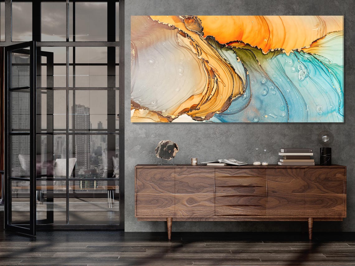 Three-panel abstract geode-inspired artwork shows swirling mineral-like bands in warm beige and orange transitioning into teal and blue detail view