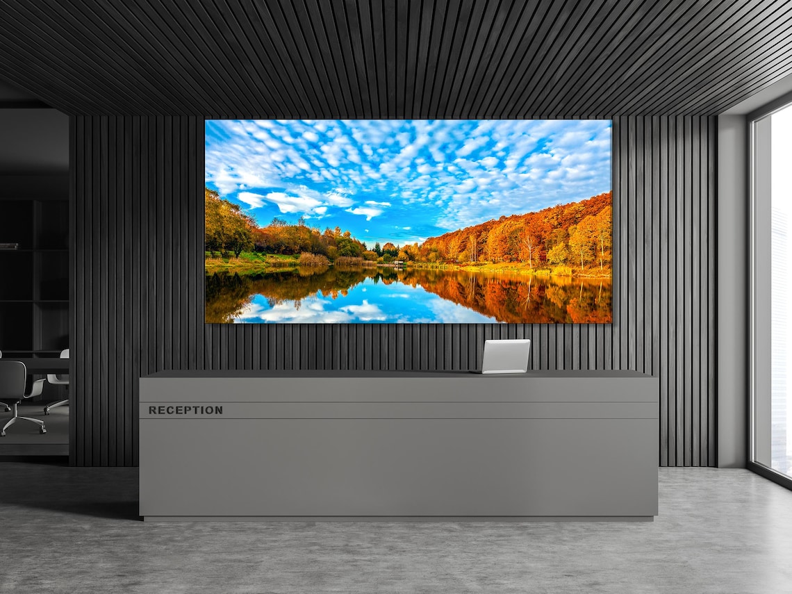 Room mockup with beige sofa and a five-panel autumn lake landscape artwork above