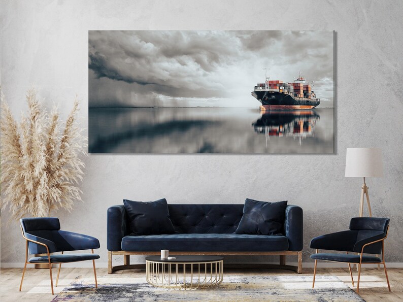Cargo ship on calm water beneath stormy grey clouds with reflected orange containers