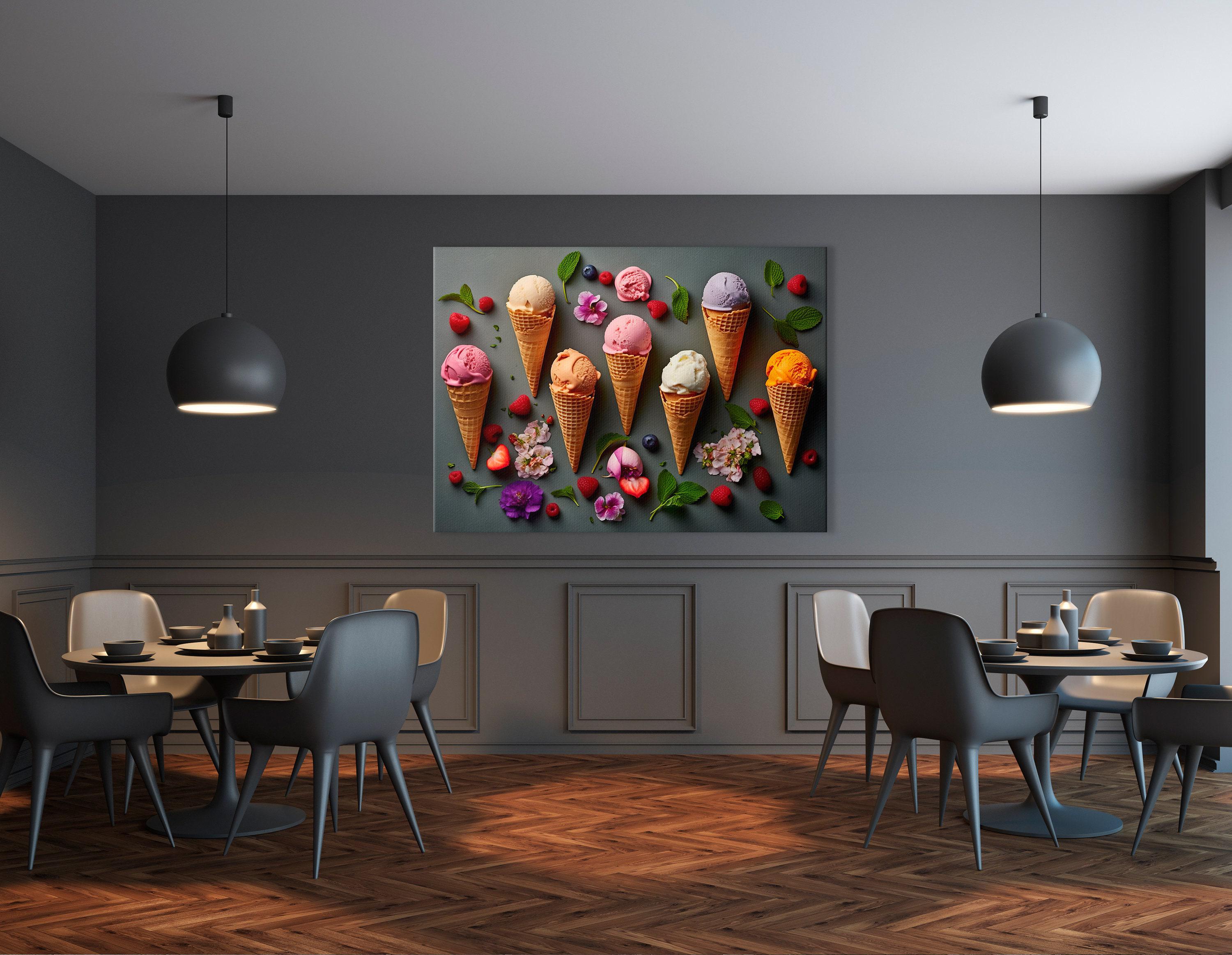 A colourful arrangement of ice-cream cones, scoops and berries sits on a dark grey background, surrounded by scattered flowers and mint leaves detail