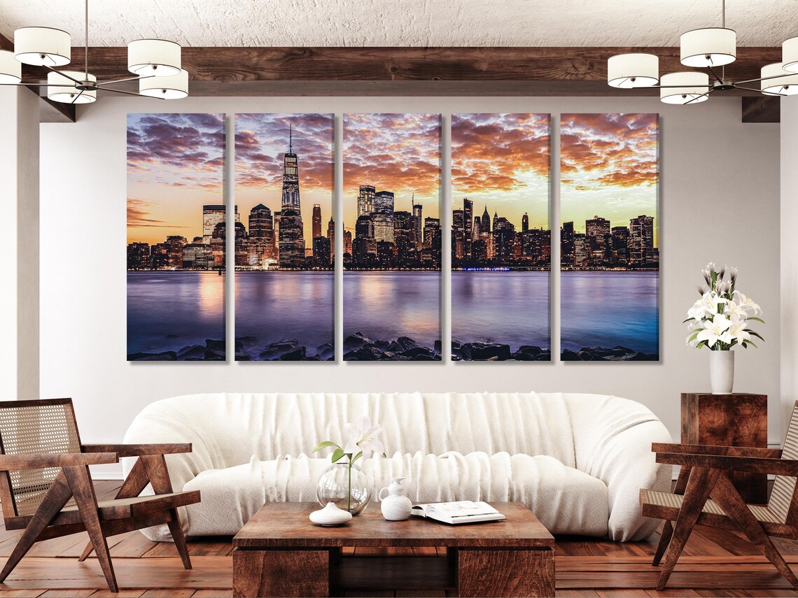 Room mockup featuring a sunset city skyline artwork above a sofa