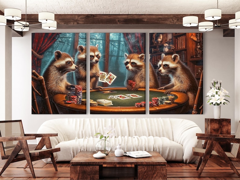 Three raccoons in a card-playing scene sit around a poker table, with window-like trees and warm timber tones in the background