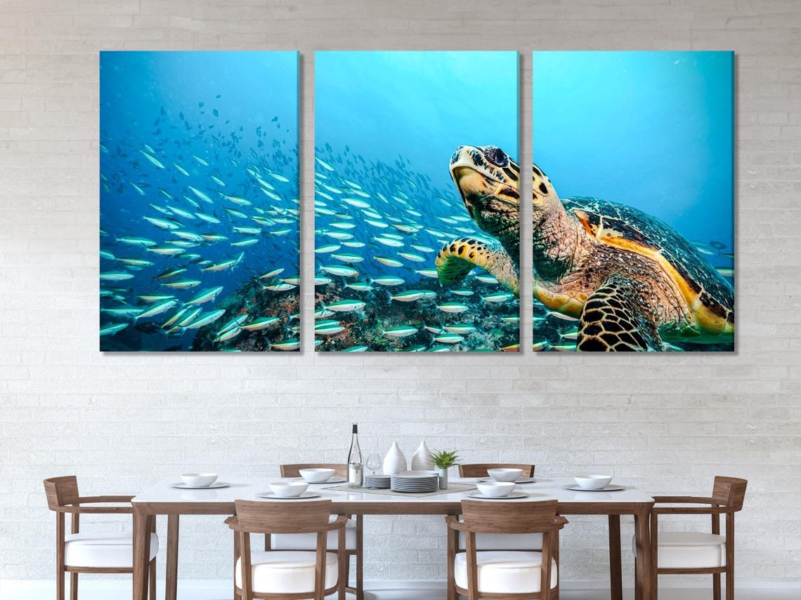 Living room mockup showing an underwater sea turtle artwork above a sofa